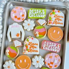 some decorated cookies in a box with the words,'amazing things are made out of sugar