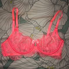 Brand New With Tags In A Size 32c. The Color Is More Of A Bright Coral Than A Hot Pink. The Hardware Is Gold Which I Think Is Pretty Cute! Feel Free To Send Me An Offer! Pink Sheer Underwire Bra, Feminine Pink Sheer Bra, Pink Sheer Bra For Spring, Sheer Pink Bra For Spring, Spring Sheer Pink Bra, Pink Padded Party Bra, Pink Underwire Bra For Party, Party Pink Bra With Padded Cups, Pink Party Bra With Lined Body