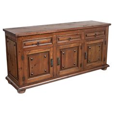 an old wooden sideboard with drawers and knobs on the doors is isolated against a white background