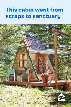 a small cabin in the woods with an awning over it's porch and patio