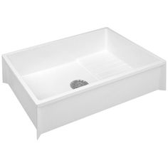 a large white sink with no faucet in the bottom and an open drain