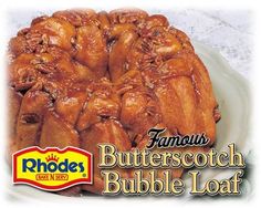 a close up of a bundt cake on a plate with the words famous butterscotch bubble loaf