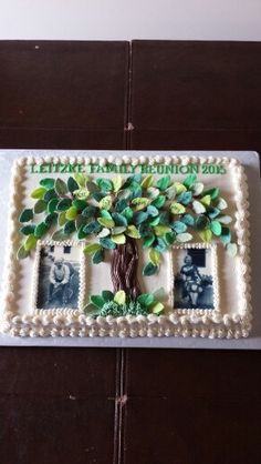 a cake decorated with green leaves and photos