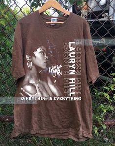 Lauryn Hill Everything is everything T-Shirt, 90's Lauryn Hill T-shirt, Retro Music  gift for men women unisex t-shirt : 100% Cotton (fiber content may vary for different colors) .: Medium fabric (5.3 oz/yd² (180 g/m .: Classic fit .: Runs true to size HOW TO ORDER Pick you favorite design. Review the size & color charts above FIRST and then select shirt size and color from the dropdown menu. Indicate the birthday year in the personalization box. Please note size measurements for t-shirts may differ +/- 1 inch due to the manufacturer. Colors may not exactly match what's shown on screen. Thanks for stopping by my shop. Feel free to reach out for any questions you may have. I appreciate your business.