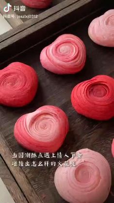 red onions are being made in an oven with pink frosting on them and the words,