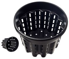 a black plastic strainer with holes on the side and an object in front of it