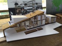 a model of a house on top of a table