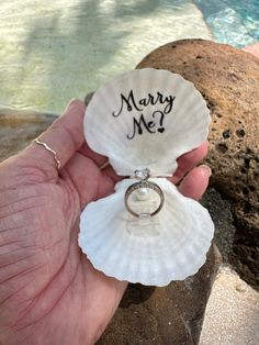 "Proposal seashell ring box,beach ring holder,getting engaged ring holder, surprproposal ring holder,proposal seashell, will you marry me  Beach proposal white seashell ring holders are fresh out of the ocean! These round white textured fan paired seashells were especially made due to numerous requests for THE MOST NATURAL look --in order to make the greatest impact and surprise for a beach proposal. They are made with gorgeous yet  shells.. Each is unique and they are not perfect- which adds ch Engaged Ring, Kule Ting, Seashell Ring, Beach Proposal, Cute Couple Gifts, Ring Holders, Killing Eve, Dream Wedding Ideas Dresses, Future Wedding Plans