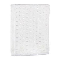 a white knitted blanket on a white background