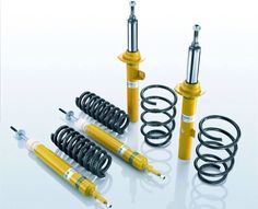 the front and rear suspensions of a car with springs, shock absorbs and coils