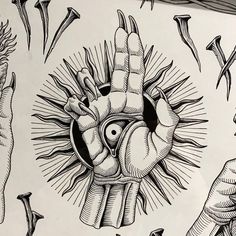 an ink drawing of a human heart surrounded by other hand and finger symbols, all in black and white