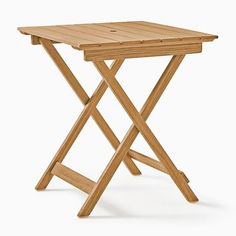 a wooden folding table on a white background