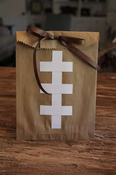 a paper bag with a football design on it