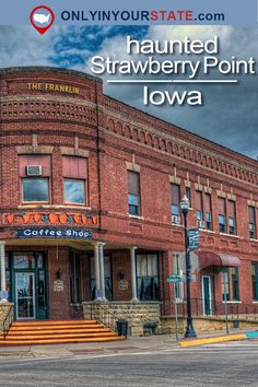 an old red brick building with the words, haunted strawberry point iowa