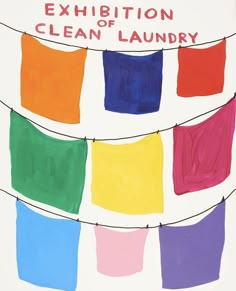 an exhibit of clean laundry is displayed on a white board with colored squares in it