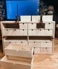 the drawers are open and ready to be put into storage units for sale at the store