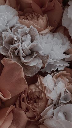 an arrangement of pink and white flowers