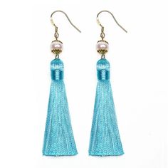 Inspired from the tassel earplugs worn by Audrey’s character Holly in Breakfast at Tiffany’s, our tassel earrings are the perfect alternative to wear as part of costume to be seen around town while being able to hear the flattering chatter coming at you from all directions. Now, meet the newest addition to our oh so pretty gold and pearl tassel earrings collection, aka the tiffany blue. Handmade with the same artisan details, these gorgeous tiffany blue tassel earrings feature fresh water pearls Blue Tassel Earrings, Lavender Earrings, Tiffany Earrings, Blue Tassel, Make Her Smile, Earplugs, Rainbow Earrings, Freshwater Pearls Earrings, Blue Gift