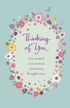 a greeting card with flowers and the words thinking of you