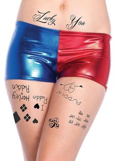 two women with tattoos on their butts and one wearing red, blue and silver shorts