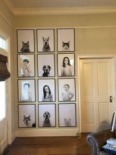 a living room filled with lots of pictures on the wall