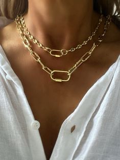 1. Top necklace  5mm links with a mini gold carabiner     14K gold plated brass     screw clasp closure            16" or 18" length 2. Second necklace      links 20mm x 9mm      14K gold plated brass      gold carabiner clasp           screw clasp closure       16" or 18" length Carabiner Necklace, Gold Link Chain, Necklace Chunky, Gold Link, Link Chain Necklace, Chain Link Necklace, Link Chain, Layered Necklaces, Chains Necklace