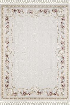 a white rug with flowers and scrolls on the border, in front of a white background