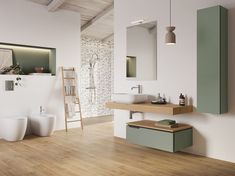 a white bathroom with wooden floors and walls