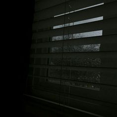 the blinds are closed in the dark room