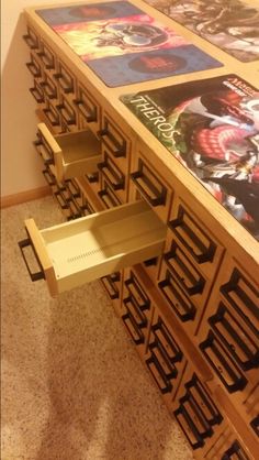 a large wooden table with several drawers on it