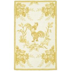 a yellow and white rug with a rooster on it