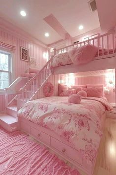 a pink bedroom with bunk beds and pillows on the bottom bed, stairs to the second floor