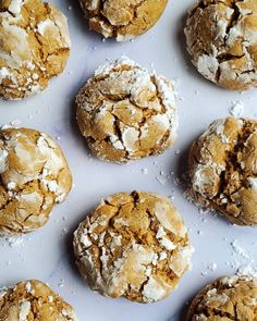 several cookies are covered in powdered sugar