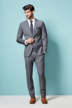 Formal Poses, Pose Men, Wedding Suits Men Grey, Capsule Wardrobe Men, Gray Groomsmen Suits, Mens Wardrobe Essentials, Charcoal Gray Suit, Tan Guys, Mens Fashion Blog