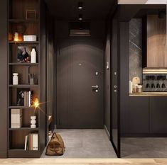 an open door leading to a kitchen and living room with wood flooring on the walls