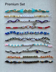 the beaded bracelets are lined up in rows