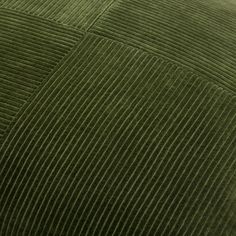 close up view of green corduro fabric