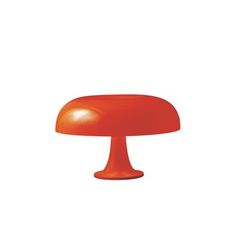 an orange mushroom lamp on a white background