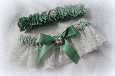 "Listing includes a Sage Green Satin with Lace shown in White bridal garter with a pearl and rhinestone accent.  Toss garter is all satin measuring 1 1/2\" wide and includes a matching rhinestone and pearl accent. This one is shown with ivory lace in the photos.  The ivory is very light.   Accent bows and bling included. The color Sage shown here does not match all designer colors called \"Sage\"  Please converse with me so that I can help you match your sage shade. My garters are made with plen White Lace Garter, Lace Garter Set, Garter Wedding, Flower Girl Baskets, Ring Bearer Pillow, Unique Color Combinations, Lace Garter, Bridal Garter, Wedding Garter