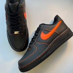 Orange stitched custom on an authentic black AF1. Sizing Details Air Force 1's run big, so we recommend customers choose a half size smaller than their usual size. **Sizes listed are Men sizes, equivalent women sizes can be seen in size chart on the last slide** Black Classic Nike Air Force 1 For Sneaker Matching, Casual Black Custom Sneakers With Embroidered Logo, Black Sporty Sneakers With Contrast Stitching, Black Casual Custom Sneakers With Embroidered Logo, Black Nike Air Force 1 Fade-resistant For Streetwear, Black Low-top Sneakers With Contrast Stitching, Casual Fitted Black Sneakers, Fitted Black Casual Sneakers, Black Nike Air Force 1 Casual Fade-resistant