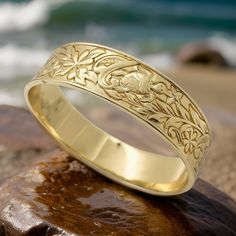 This Bangle Bracelet Features A Beautiful Honu And Floral Design. It Is Considered Medium To Heavy Weight. Very Comfortable To Wear, And Sturdy To Hold Its Shape. This Bracelet Is 15mm Wide. Jewelry Gold Bracelet, Hawaiian Bracelets, Hawaiian Jewelry, Jewelry Beach, Gold Armband, Floral Bracelet, Beach Jewelry, Jewelry Gold, Jewelry Plate