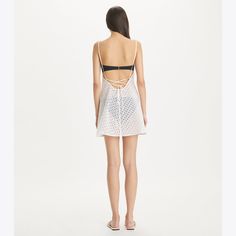 Effortless and feminine, our broderie anglaise mini dress is cut from crisp cotton in delicate eyelet embroidery. Adjustable shoulder straps tie in the back for a fitted and flared silhouette. Eyelet Embroidery, Diamond Shop, Handbag Shoes, New Handbags, Satin Dresses, Sales Gifts, Women Empowerment, Shoulder Straps, Designing Women