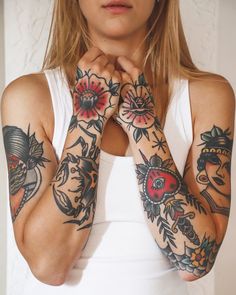 a woman with many tattoos on her arms