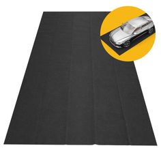 a black mat with a car on it