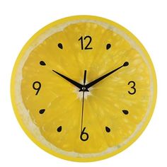 a clock made out of lemon slices on a white background with the time twelve o'clock