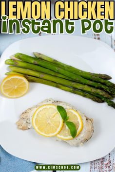 lemon chicken and asparagus on a white plate