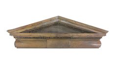 an old wooden box with decorative carvings on the front and sides, isolated against a white background