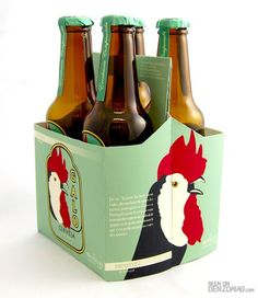 six bottles of beer in a box with an image of a rooster on the front