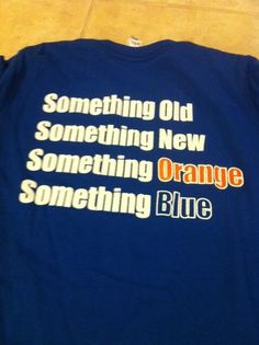 a blue shirt that says something old something new something orange something blue