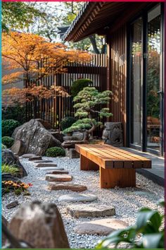 a wooden bench sitting on top of a gravel covered ground next to rocks and trees